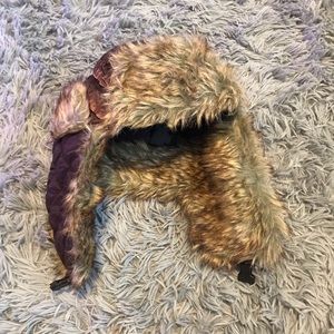 Brown Paris fur ushanka styled hat.